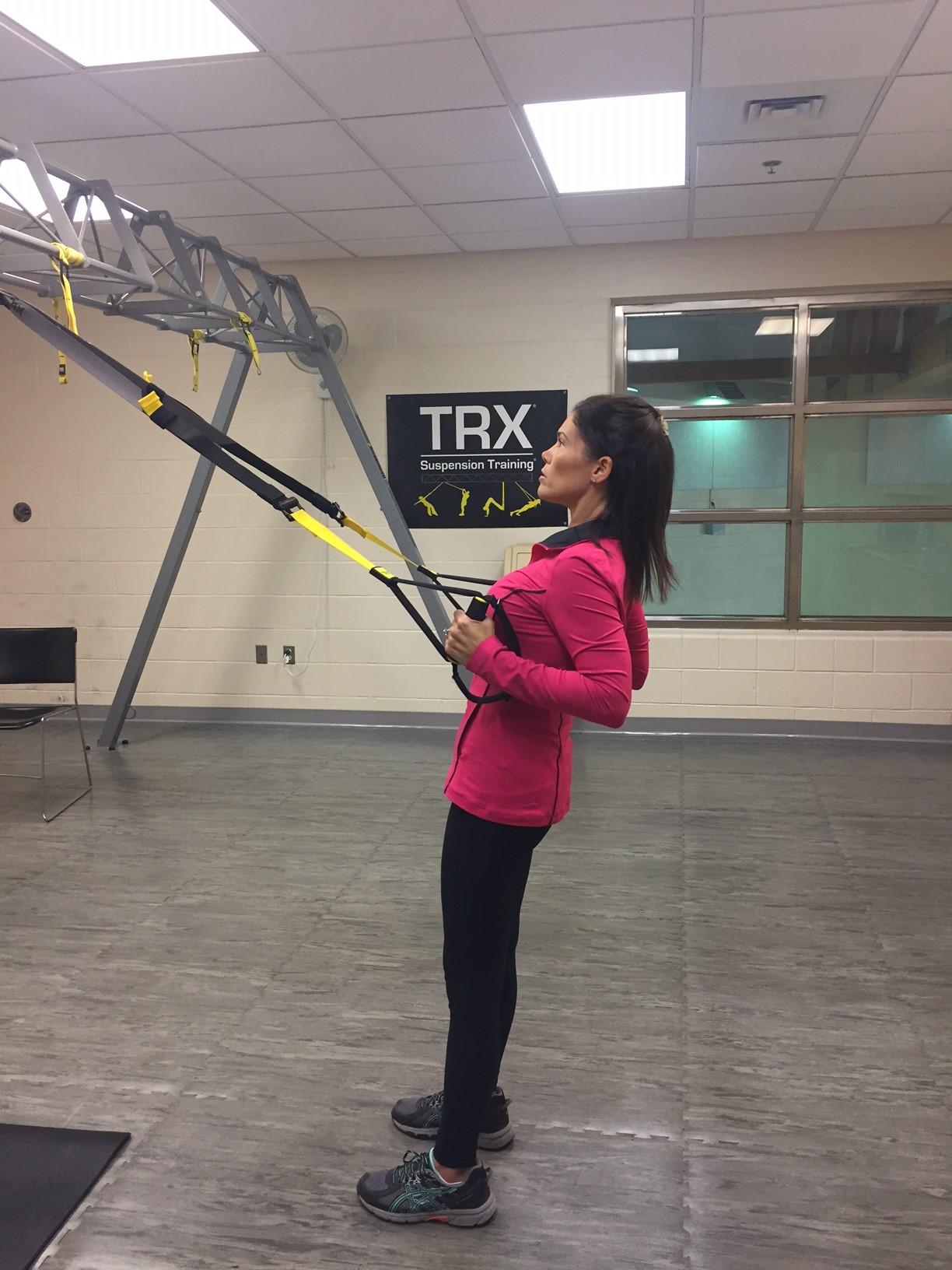 Instructor Gina Daddazio demonstrates a workout in her TRX for multiple sclerosis class at the West Chester Area YMCA