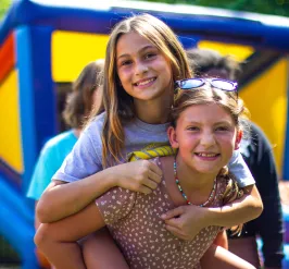 Friends pose for a photo during YMCA Camp West Chester.