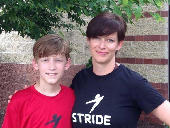 A STRIDE volunteer coach Christy Pickar with her son. 