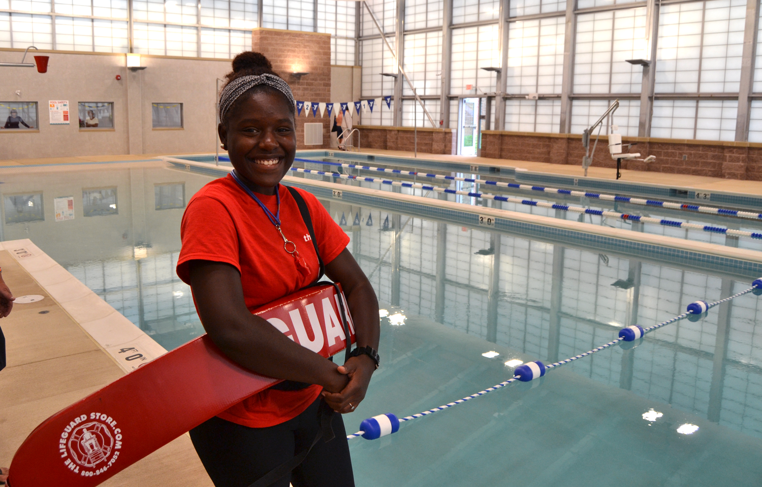 Careers - a lifeguard at the Upper Main Line YMCA at the indoor family and therapy pool