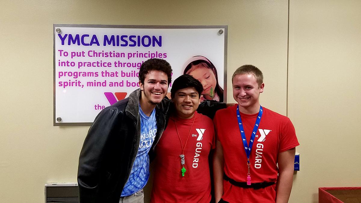 Jennersville YMCA lifeguards and Avon Grove High School seniors Long Tran, Josh Prosser and Sean Kushnerock recently saved a member’s life, thanks to the skills they learned in their training at the YMCA. 